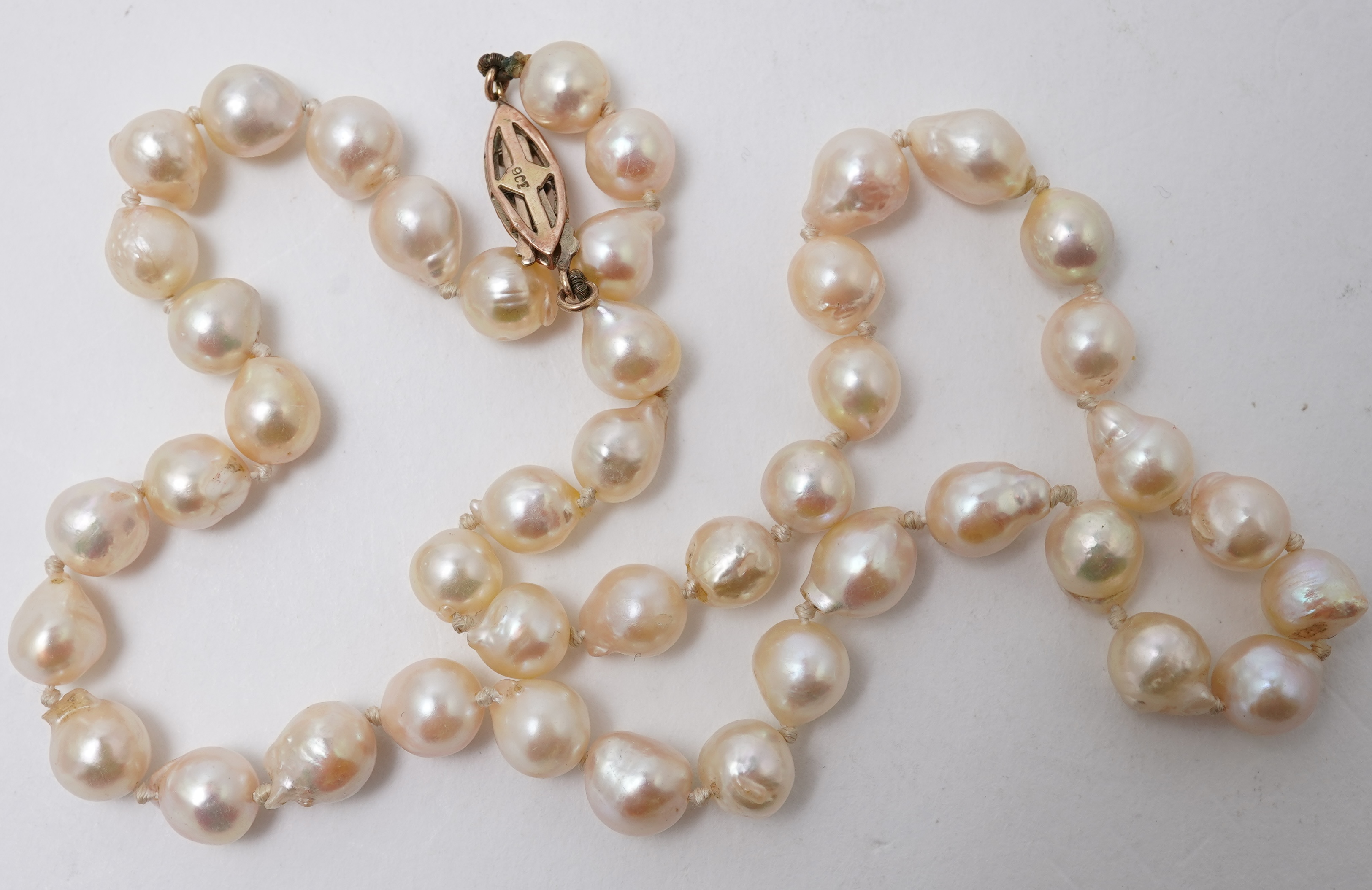 A collection of four cultured pearl necklaces